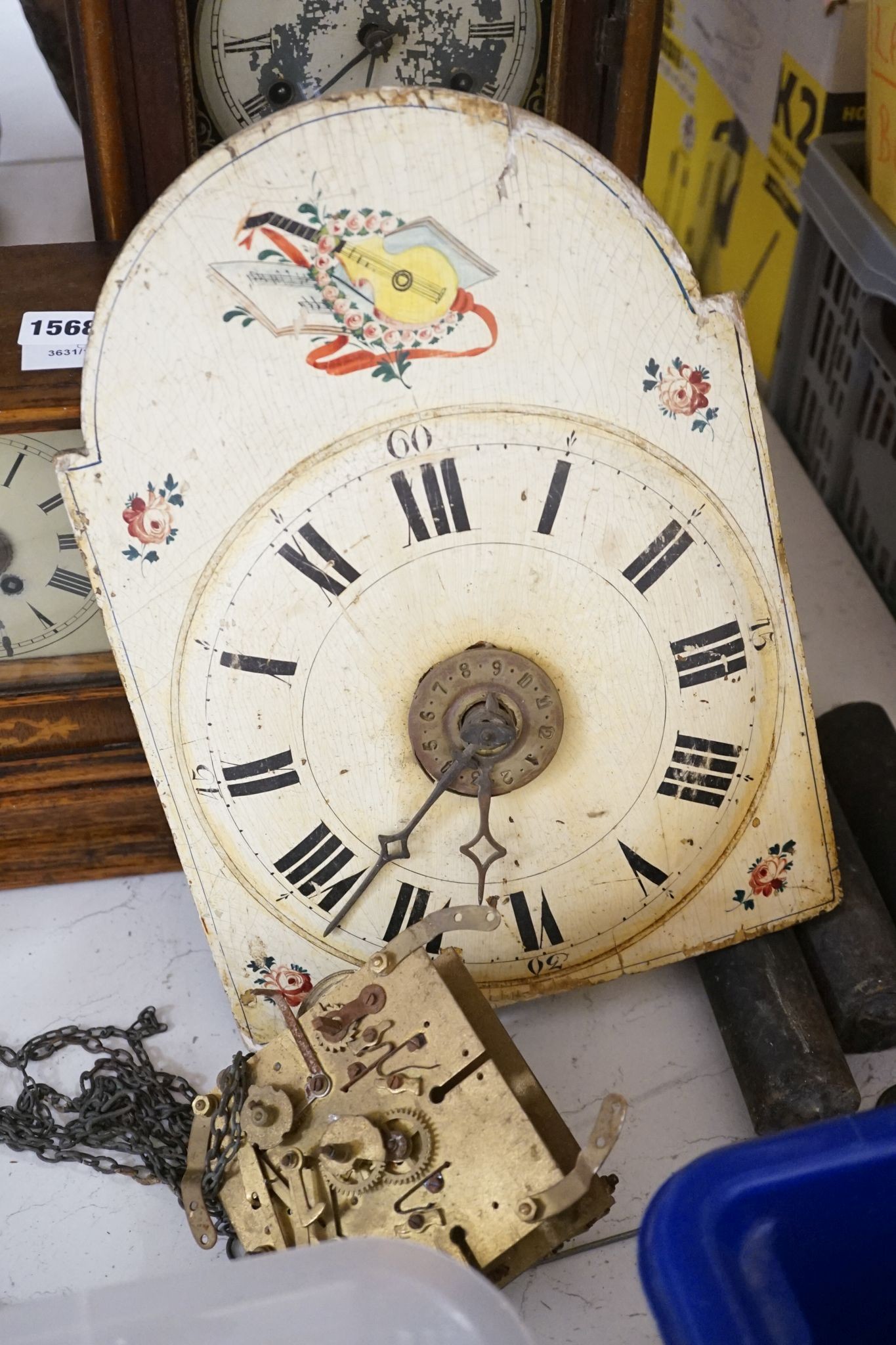 An early 19th century Dutch longcase timepiece movement, a late 29th century American shelf clock and a German mantel clock (3)